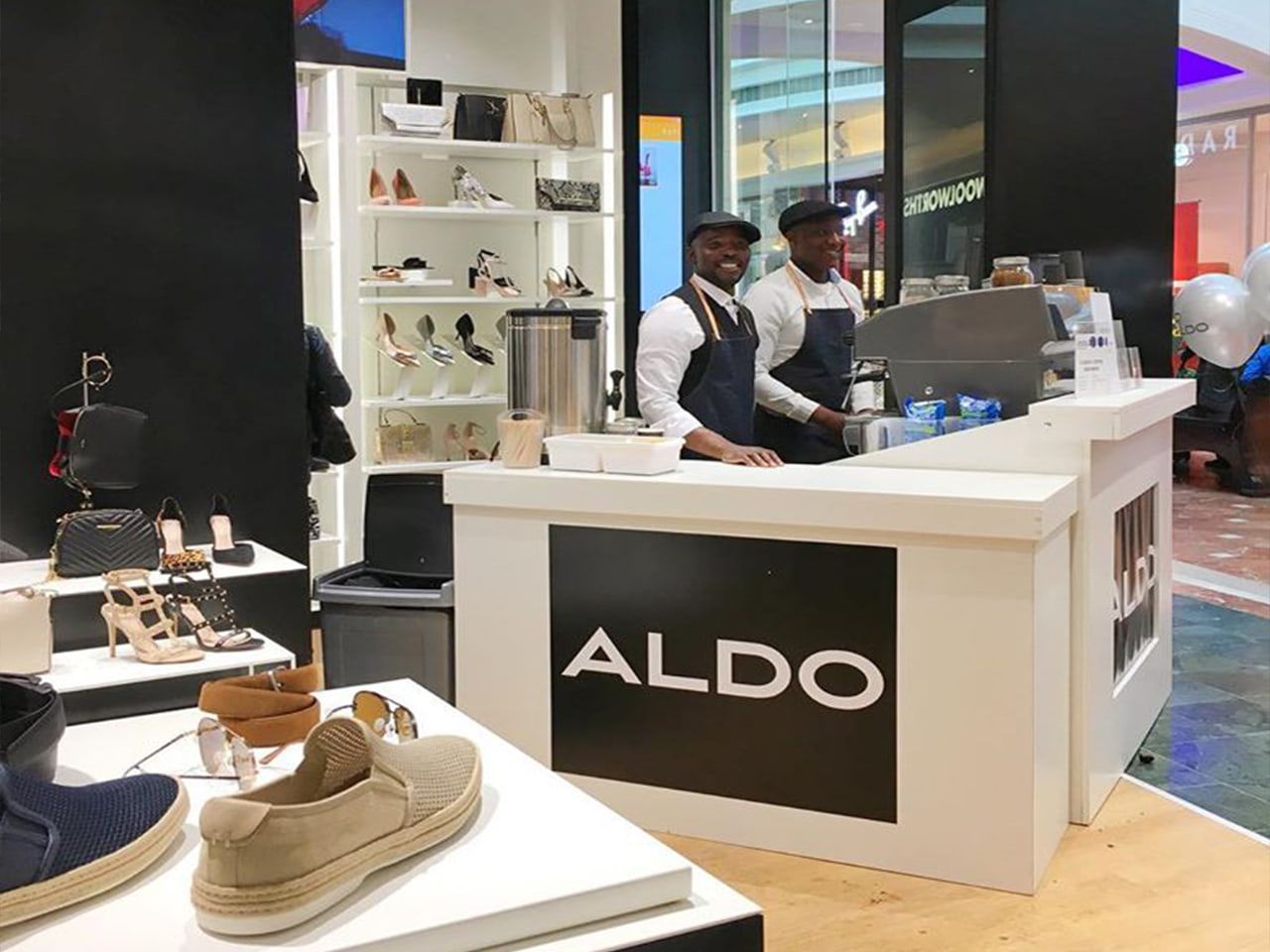 Branded ALDO counter at a retail event