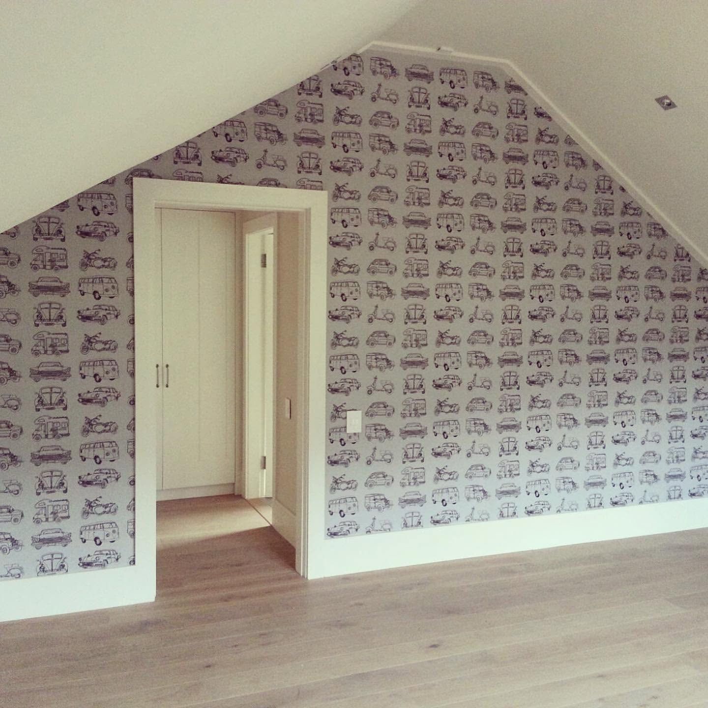 Vintage car pattern wallpaper in a child's room