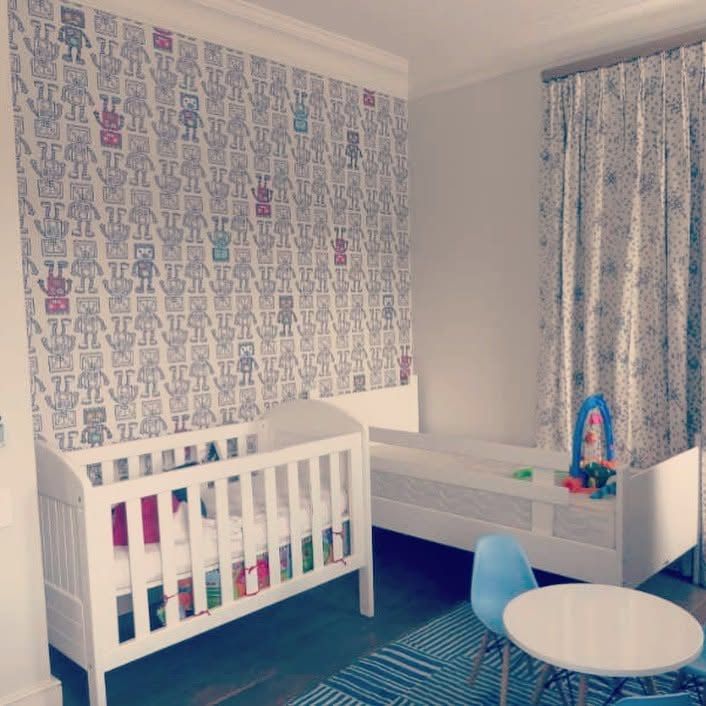 Robot pattern wallpaper in a nursery